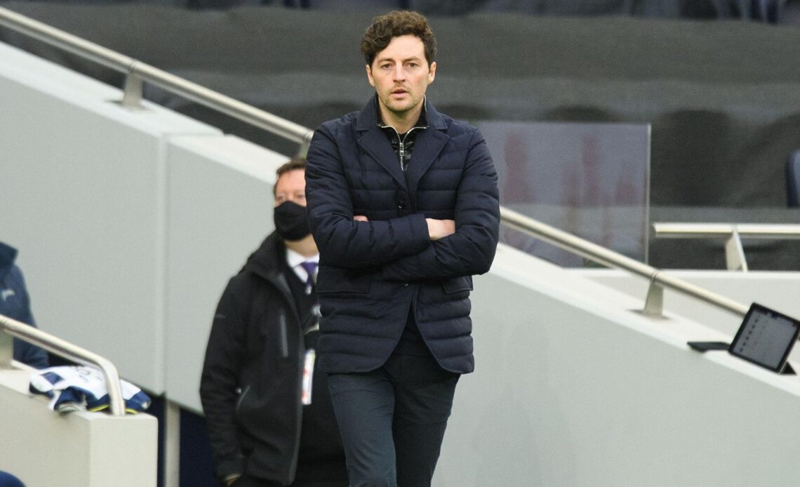 Ryan Mason watches a match from the touchline