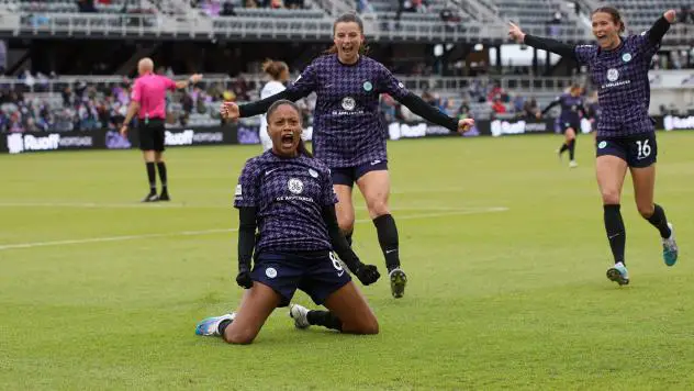 Racing Louisville FC midfielder Ary Borges celebrates her goal
