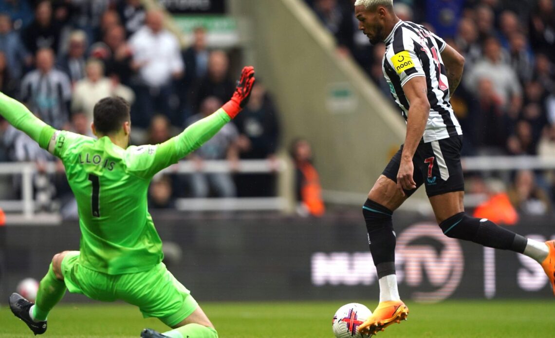 Spurs goalkeeper Hugo Lloris attempts to save an effort from Joelinton