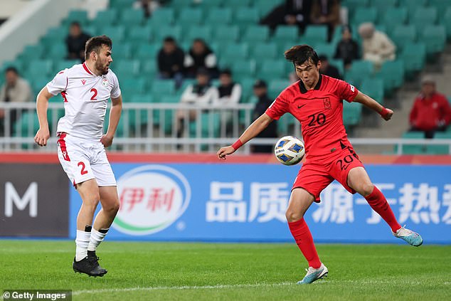 Brentford have opened talks over a move for Seongnam FC defender Kim Ji-Soo (right)