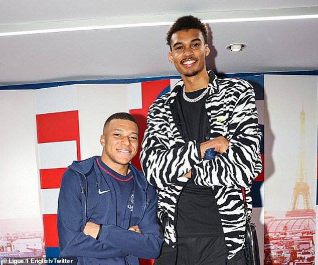 Kylian Mbappe (left) joined basketball prodigy Victor Wembanyama at the NBA Draft Lottery
