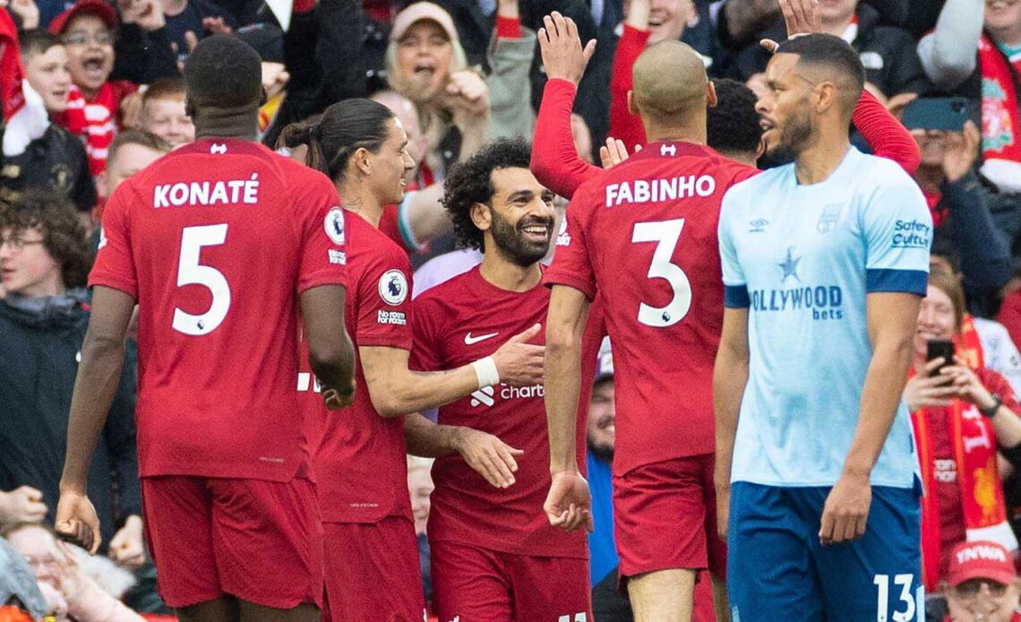 Mo Salah #11 of Liverpool celebrates his goal with team-mates during the Premier League match between Liverpool and Brentford at Anfield,