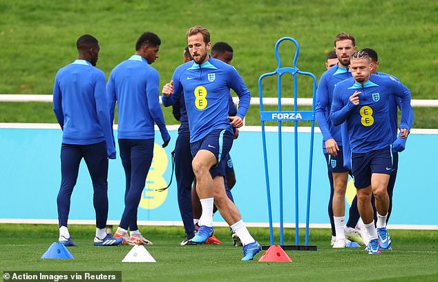 Harry Kane (centre) would welcome another England player joining the club after his move in the summer window