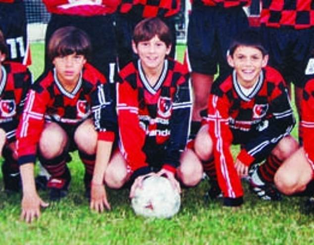 Messi (center, playing for the team as a youngster) has plans to retire with Newell's Old Boys back in Rosario, Argentina - the first professional club he represented