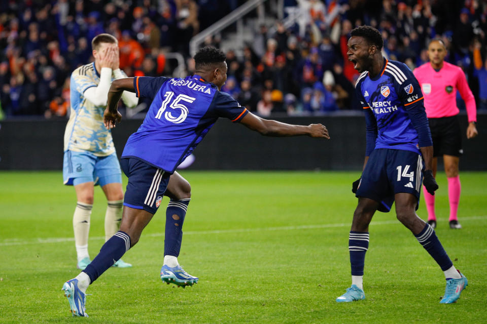 CINCINNATI, OH - NOVEMBER 25: FC Cincinnati defender Yerson Mosquera (15) reacts with forward Dominique Badji (14) after Mosquera scores a goal during the eastern conference semifinal match against Philadelphia Union and FC Cincinnati on November 25, 2023, at TQL Stadium in Cincinnati, OH. (Photo by Ian Johnson/Icon Sportswire via Getty Images)