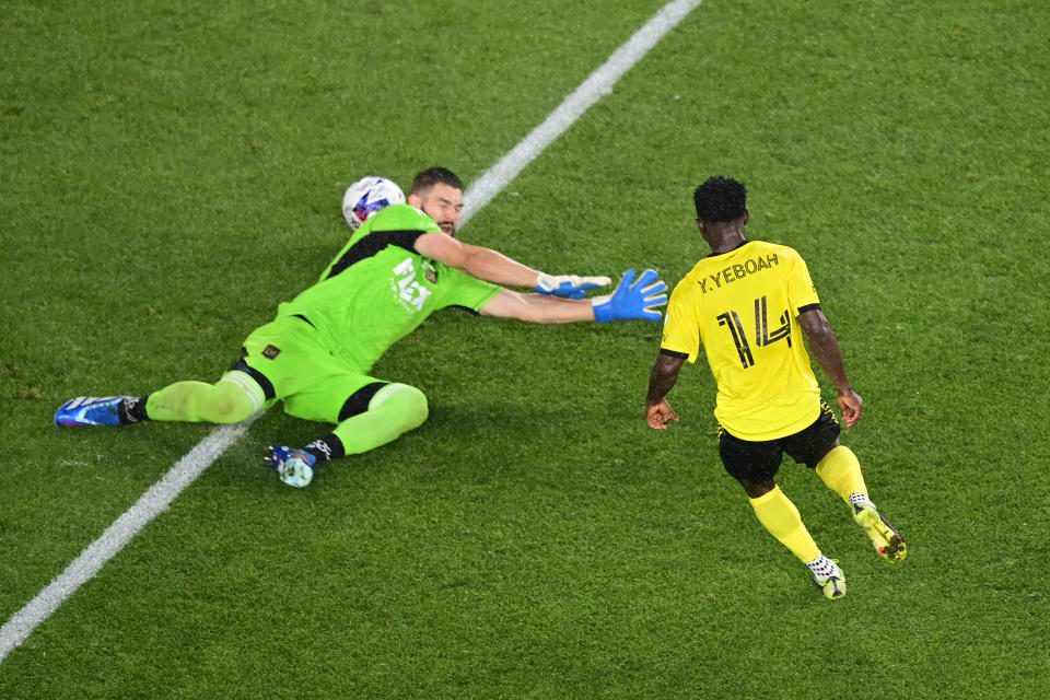 COLUMBUS, OHIO - DECEMBER 09: Yaw Yeboah #14 of Columbus Crew scores a goal against Maxime Crépeau #16 of Los Angeles FC during the first half during the 2023 MLS Cup at Lower.com Field on December 09, 2023 in Columbus, Ohio. (Photo by Emilee Chinn/Getty Images)