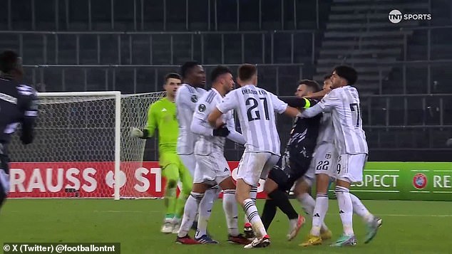 A mass brawl ensued on the pitch as both sets of players reacted to the incident