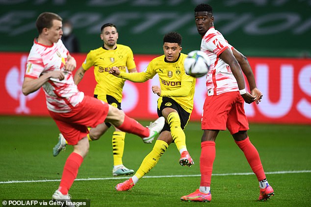The England winger in action for Dortmund when they beat RB Leipzig in the 2021 cup final