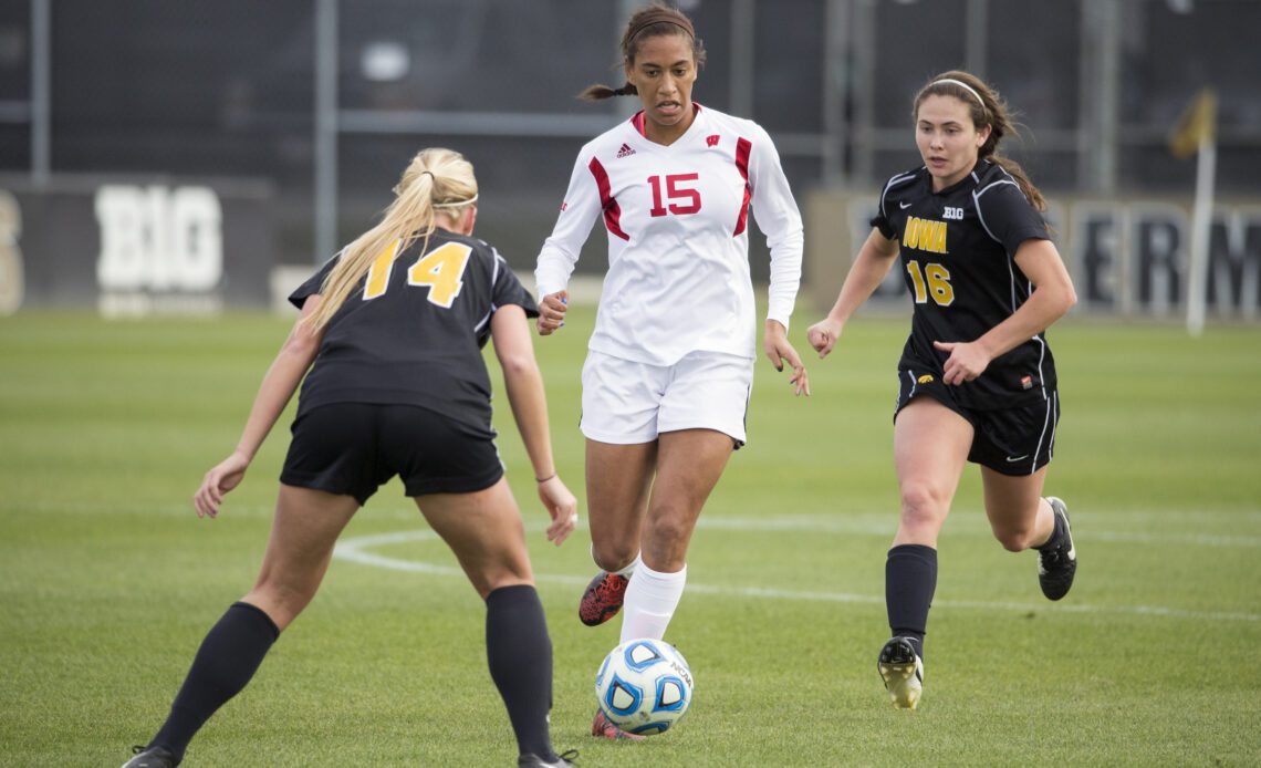 Cara Walls (15) dribbles the ball during the 2014 Big Ten Tournament Championship against Iowa, Nov. 9, 2014 (David Stluka photo)