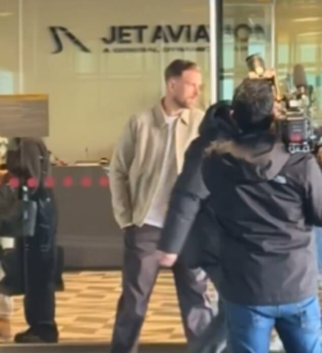 Jordan Henderson as filmed arriving in Amsterdam before being driven away by Ajax general manager Herman Pinkster