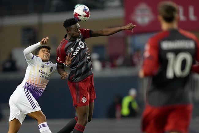 Toronto FC exercises contract option on towering defender Aime Mabika