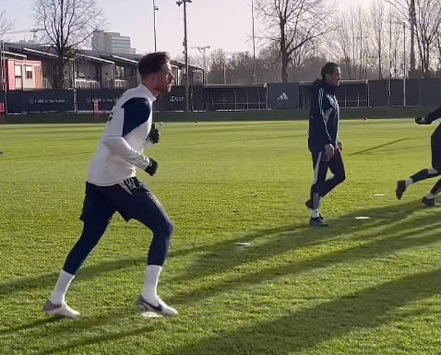 More footage showed the midfielder participating in some simple running drills alongside the rest of his team