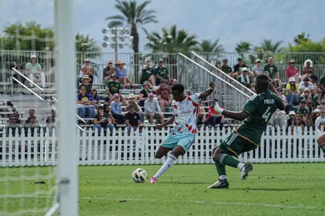 Chicago Fire FC midfielder Maren Haile-Selassie readies a shot vs. the Portland Timbers