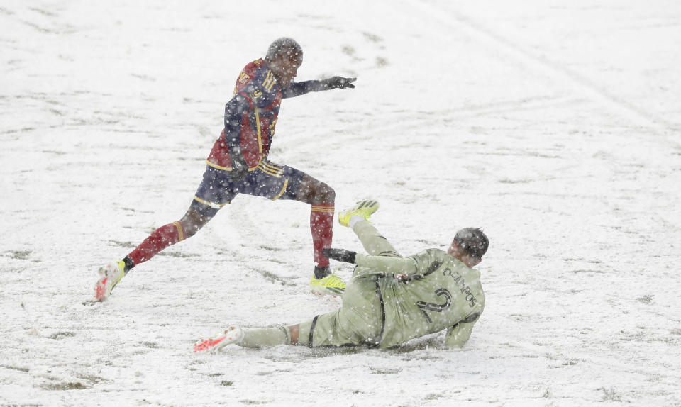 SANDY, UT - MARCH 2 : Andres Gomez #11 of Real Salt Lake pushes past Omar Campos #2 of the Los Angeles Football Club during the first half of their game at the America First Field on March 2, 2024 in Sandy, Utah. (Photo by Chris Gardner/Getty Images)