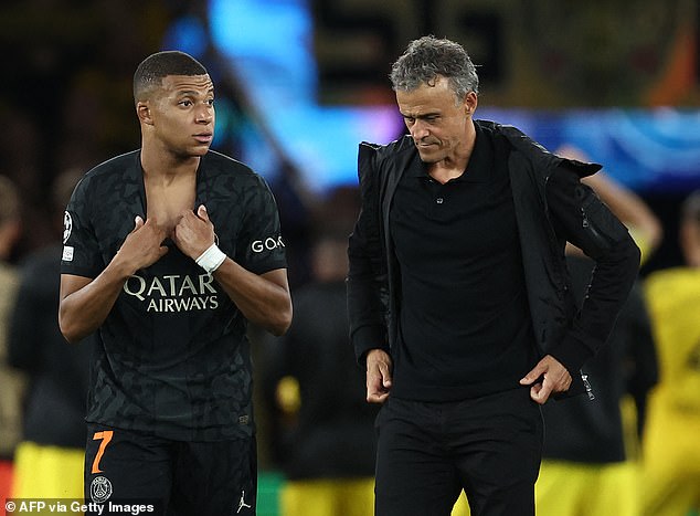 Kylian Mbappe and Luis Enrique (right) have reportedly held clear-the-air talks after the PSG coach took the striker off early in their last two matches