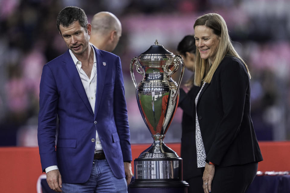 FORT LAUDERDALE, FL - SEPTEMBER 27: United States Soccer Federation CEO JT Baston and President of the United States Soccer Federation Cindy Parlow Cone pose for a photo with the U.S.Open Cup trophy during a game between Houston Dynamo FC and Inter Miami CF at DRV PNK Stadium on September 27, 2023 in Fort Lauderdale, Florida. (Photo by Jason Allen/ISI Photos/Getty Images)