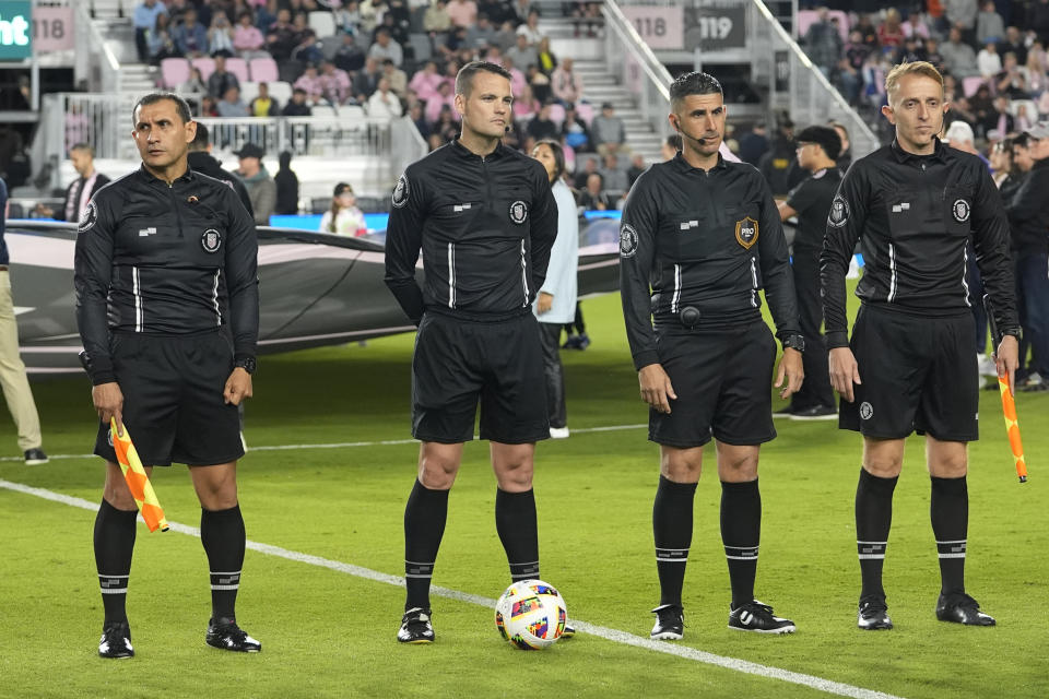 Replacement officials stand on the field before an MLS soccer match between Inter Miami and Real Salt Lake, Wednesday, Feb. 21, 2024, in Fort Lauderdale, Fla. (AP Photo/Lynne Sladky)