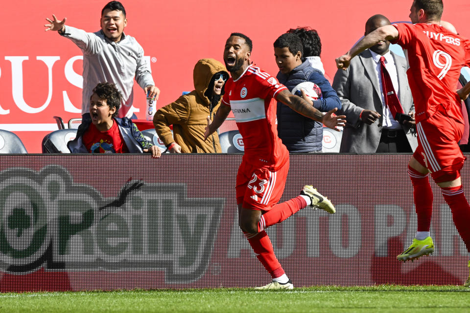 Chicago Fire forward Kellyn Acosta, center, celebrates after scoring the game winning goal during the second half of an MLS soccer match against CF Montréal, Saturday, March 16, 2024, in Chicago. (AP Photo/Matt Marton)