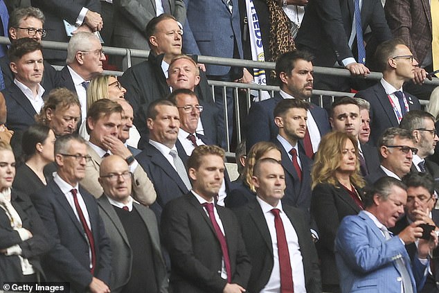 Lallana (third from right, middle row) watched on at Wembley as Southampton secured promotion to the top-flight