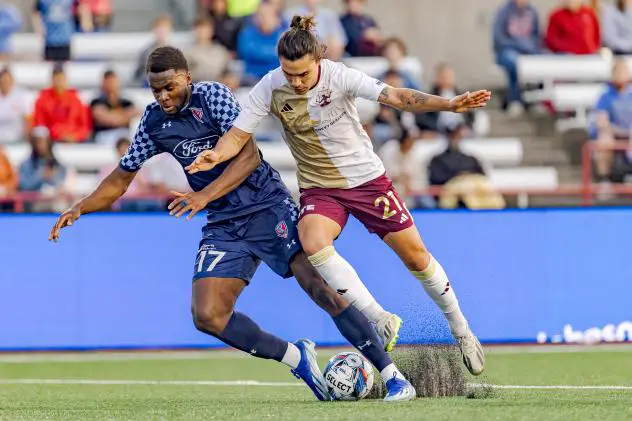 Detroit City FC midfielder Maxi Rodriguez (right) vs. Indy Eleven