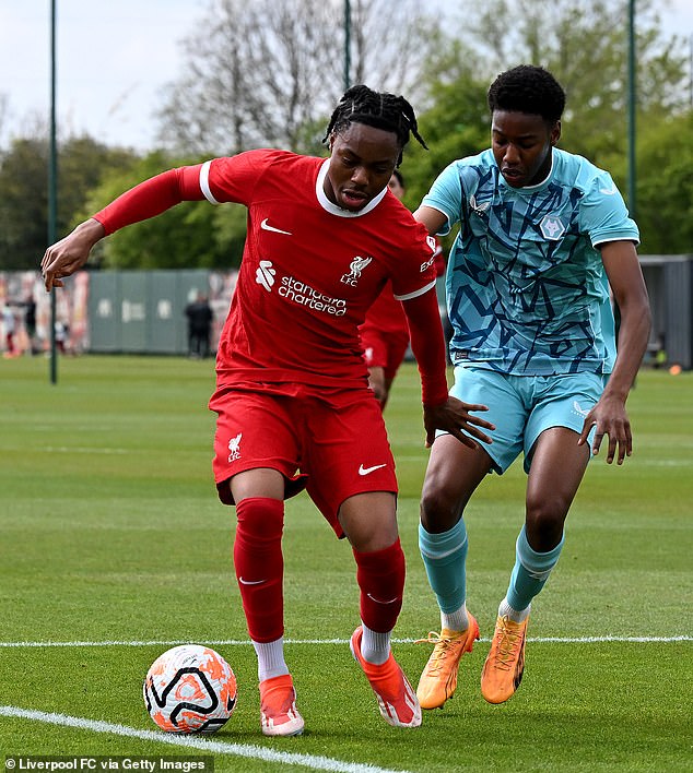Ayman (pictured playing against Liverpool Under 18s in April) could soon be joining the Reds