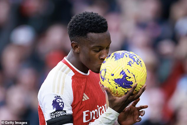 Nketiah pictured kissing a match ball in December after scoring a hat-trick vs Sheffield United