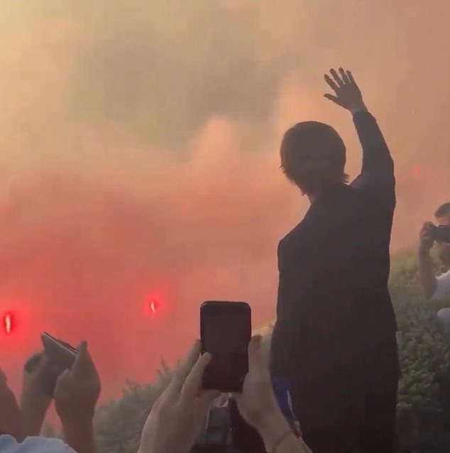 Fans let off flares with smoke covering the fans that had turned up to see the Croatian legend