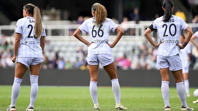 Racing Louisville forwards Elexa Bahr and Reilyn Turner along with defender Abby Erceg