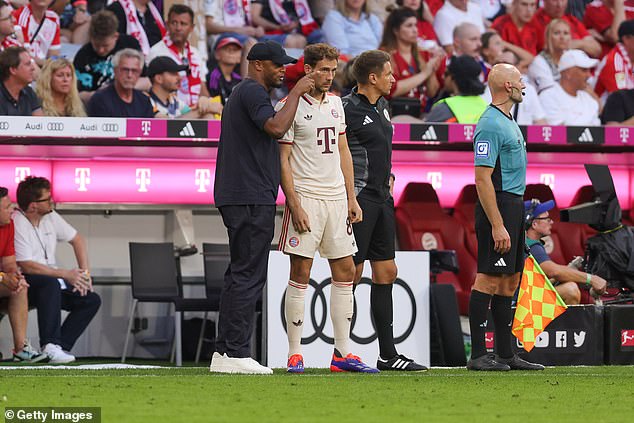 Kompany pictured speaking to Goretzka during Bayern's 2-0 win over Freiburg on September 1