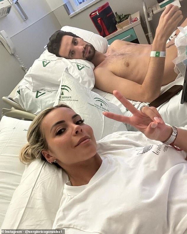 Rico and his wife Alba Silva pictured in hospital last year after the footballer's horrific accident