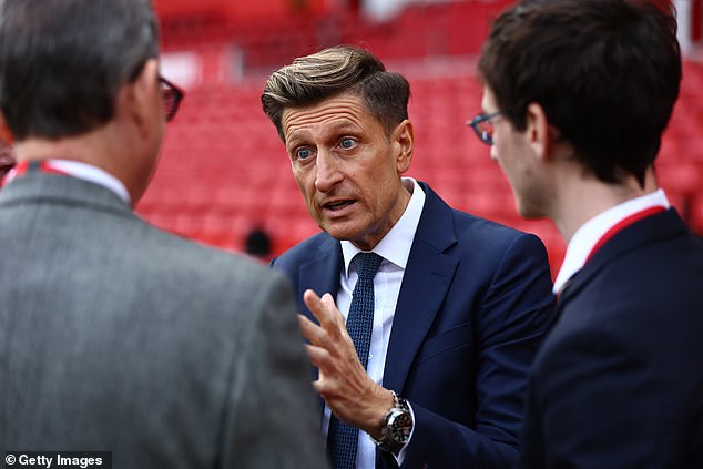 The London club were able to keep hold of the England defender despite interest from their Premier League rivals (pictured centre: Palace chairman Steve Parish)