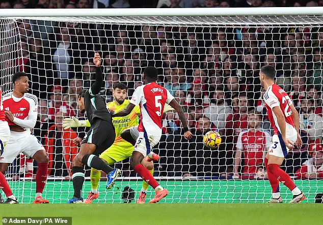 Van Dijk scored to help rescue a 2-2 draw for Liverpool against title rivals Arsenal on Sunday