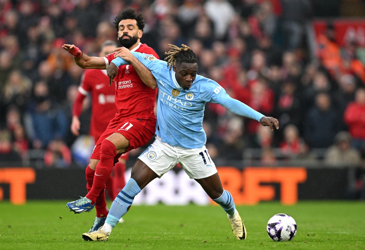 Mohamed Salah and Jeremy Doku