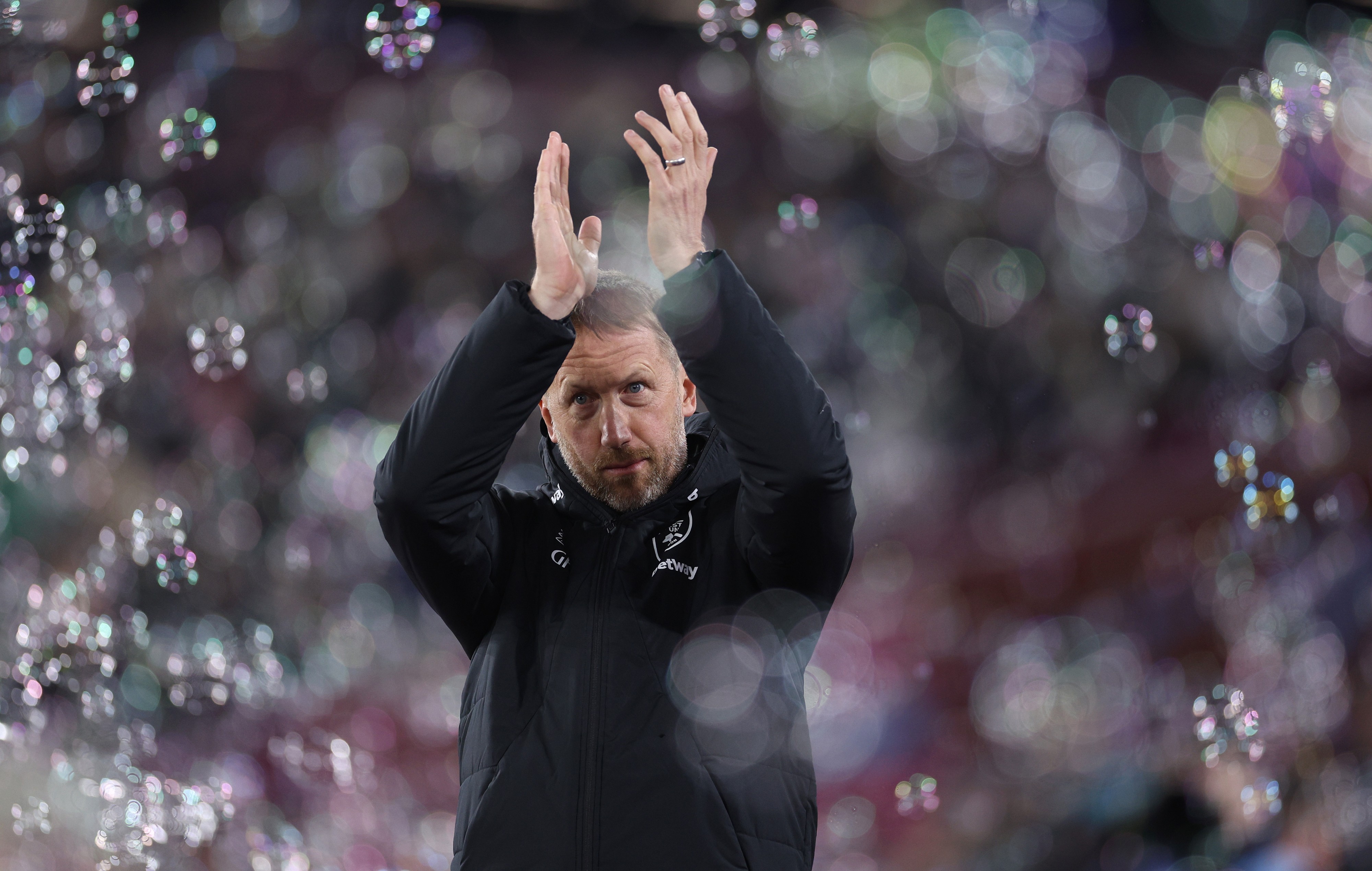 Graham Potter, Head Coach of West Ham United acknowledges the fans