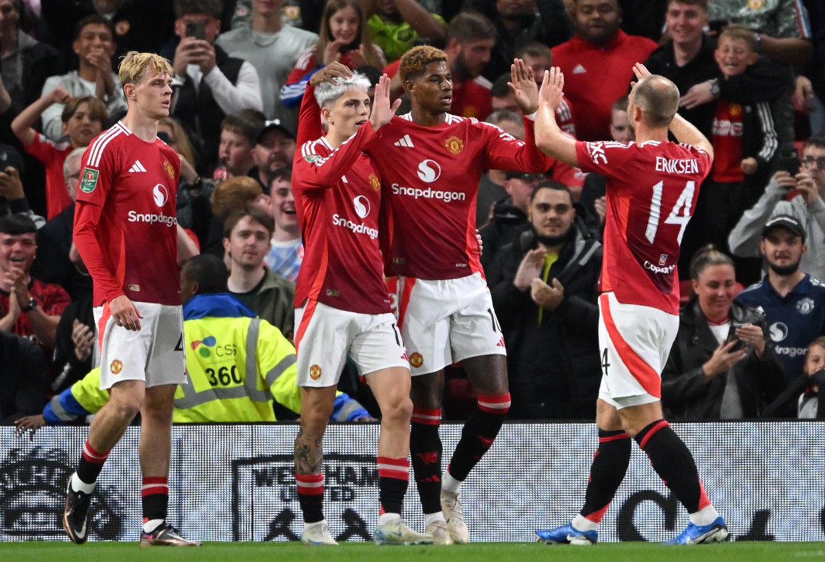 Alejandro Garnacho and Marcus Rashford celebrate in Manchester United's win over Barnsley