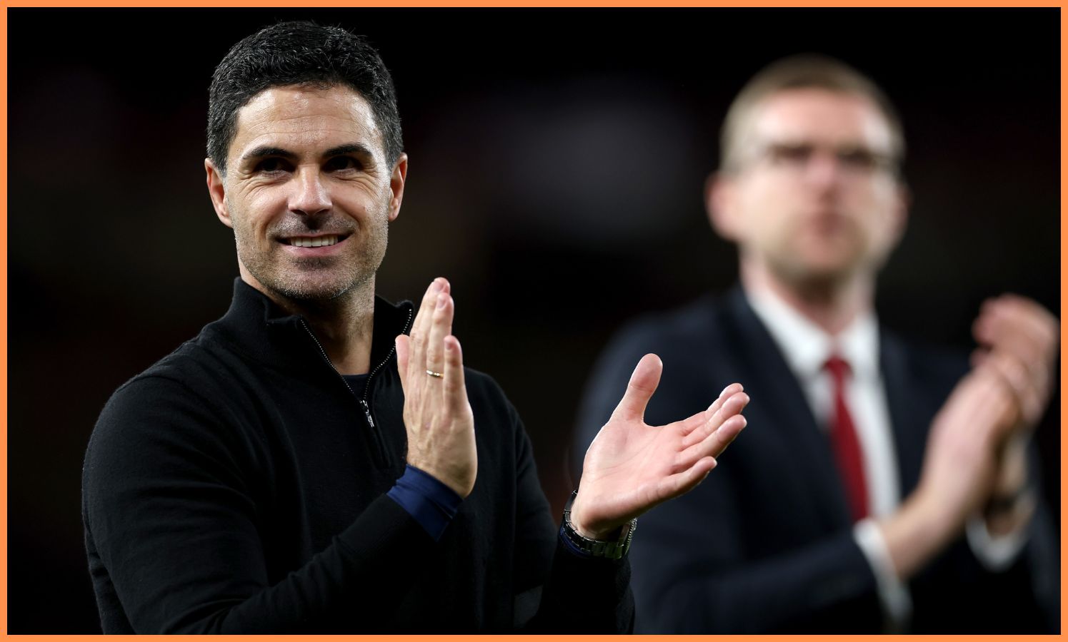 Mikel Arteta applauding the Arsenal fans after beating Burnley