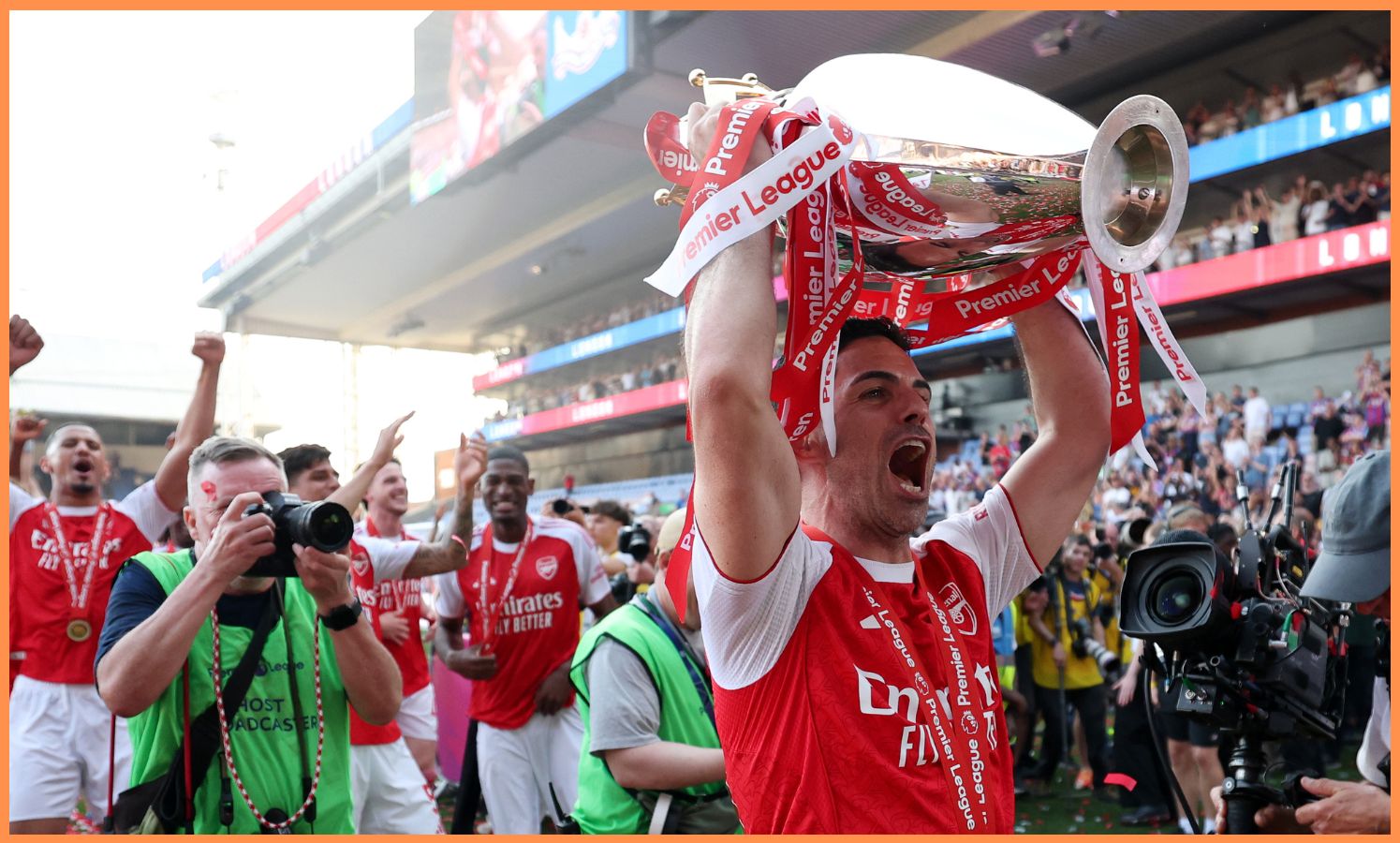 Arsenal manager Mikel Arteta lifts the Premier League trophy